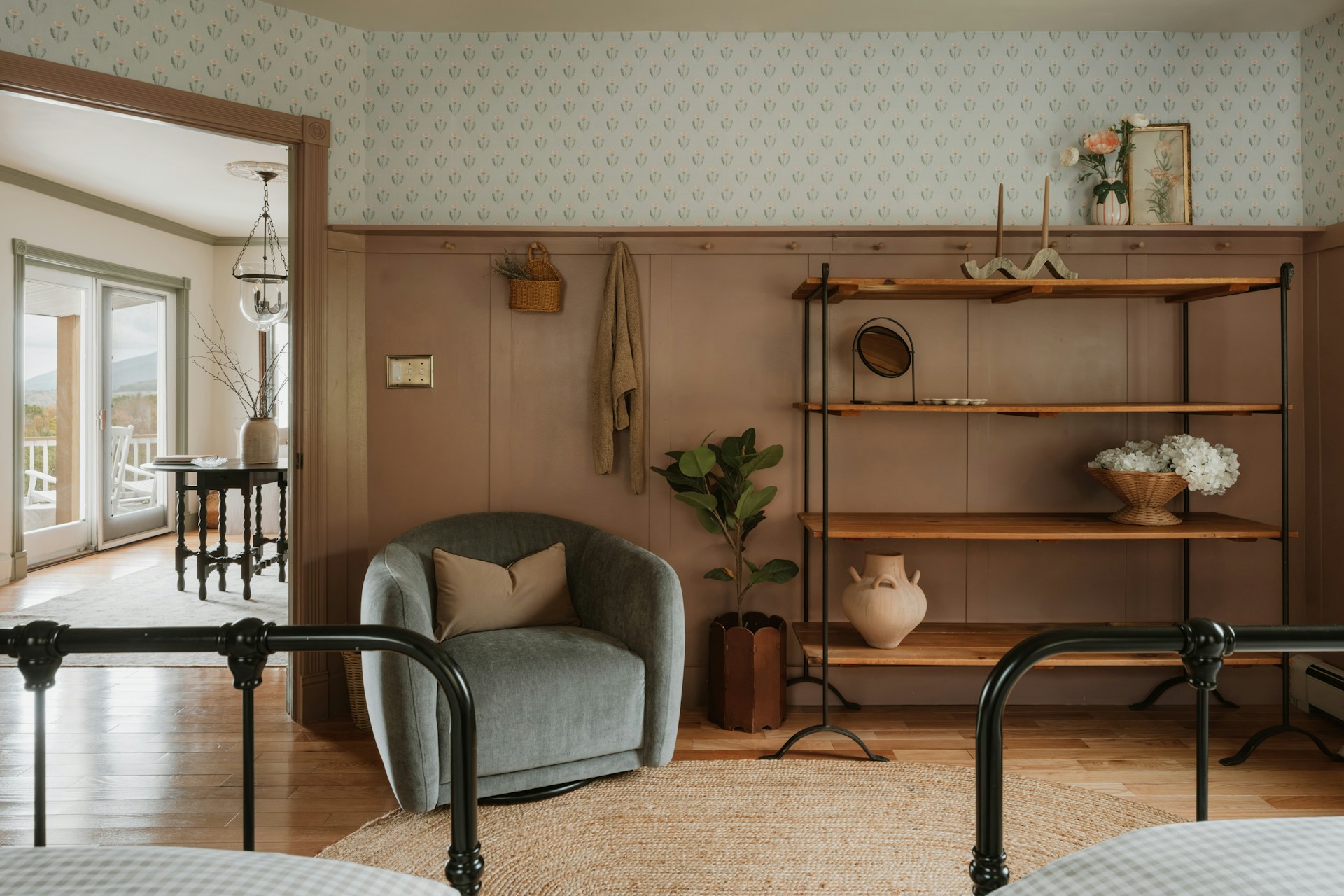 Bedroom arranged with an inviting chair for a quiet reading corner
