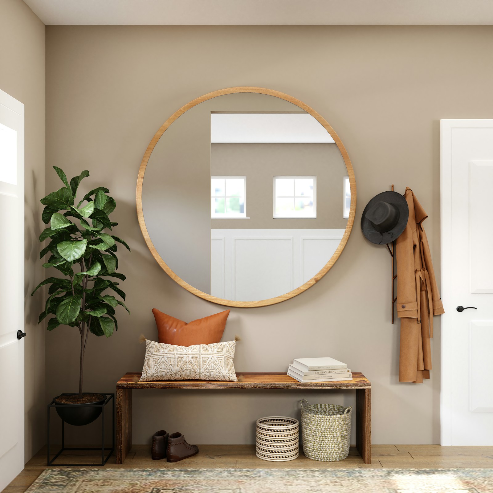 Round wood-framed mirror above a wooden bench, with baskets, boots and coat storage beside the doorway.